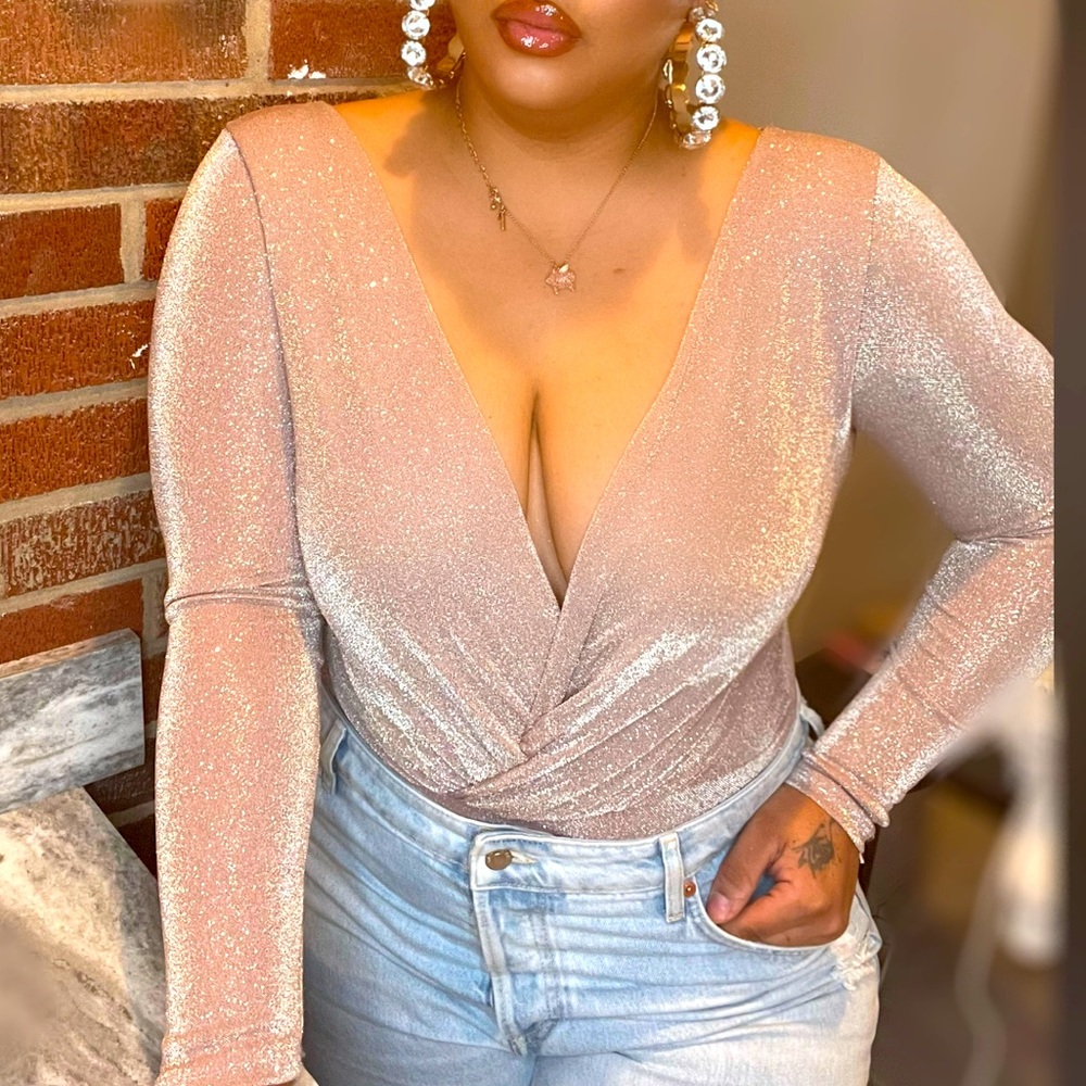 Very glammed glitter bodysuit.